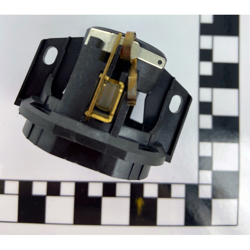 Bride de coussinet arrière + ressort de charbon